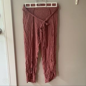 Pants with slots up full legs and tie at front